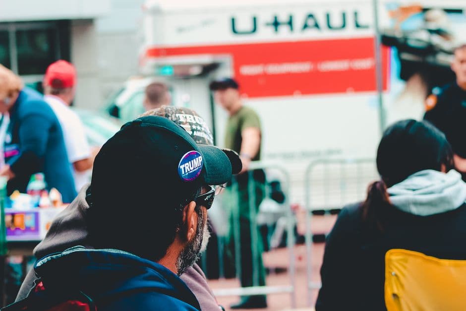 selective focus of man wearing black cap