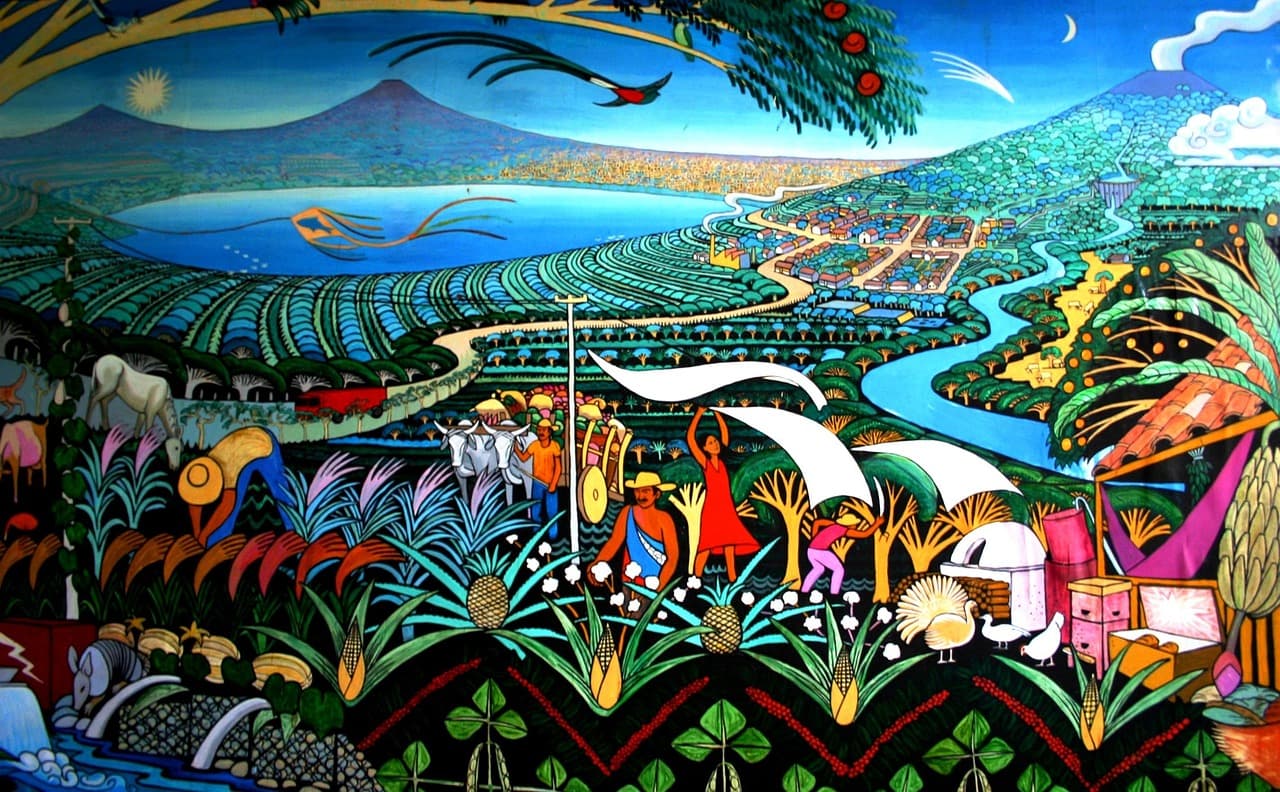 Mural colorido en una pared rural con paisaje nicaragüense, en el chat de Tisma